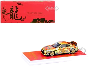 Nissan GT-R (R35) RHD (Right Hand Drive) Gold Metallic with Graphics "Year of the Dragon - 2024 Chinese New Year Special Edition" 1/64 Diecast Model