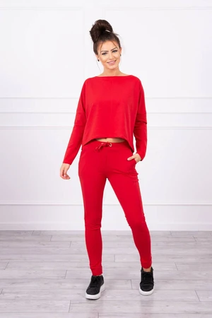 Complete with oversized red blouse