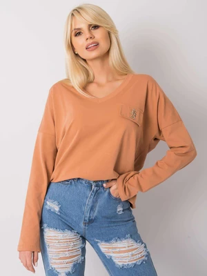Light brown cotton blouse with V-neck.