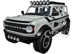 2021 Ford Bronco Gray with Black Stripes with Roof Rack "Own the Night" "Just Trucks" Series 1/24 Diecast Model Car by Jada