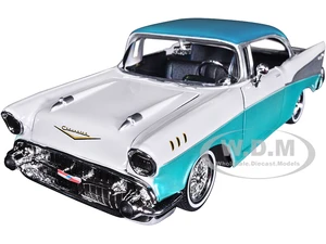 1957 Chevrolet Bel Air Lowrider Turquoise Metallic and White "Get Low" Series 1/24 Diecast Model Car by Motormax