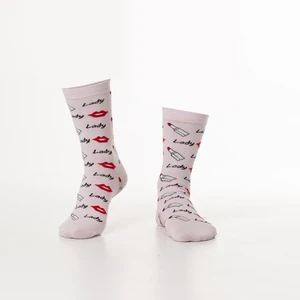Women's light pink socks on the lips