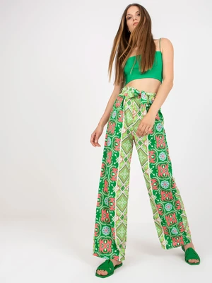 Green patterned fabric trousers with wide legs