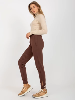 Brown trousers with leg closure by OCH BELLA