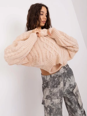 Light beige sweater with loose-fitting cables