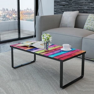 Coffee table with rainbow-print glass table topp