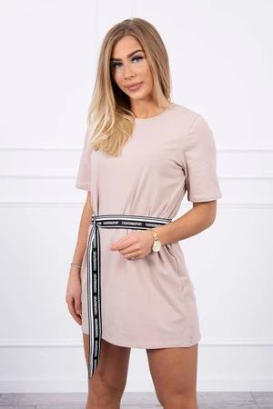 Dress with a decorative belt of beige color
