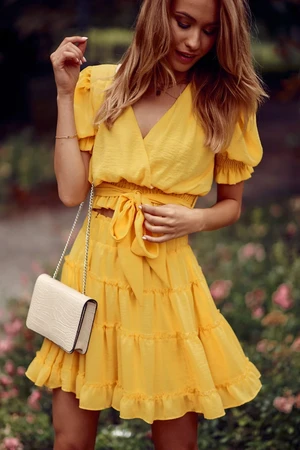 Beautiful yellow miniskirt with ruffles