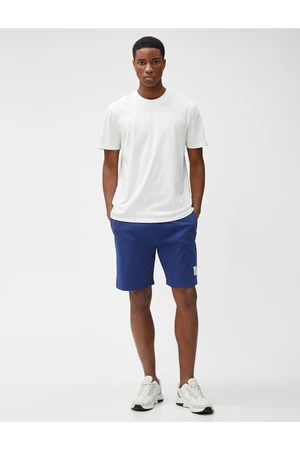 Koton Slogan Printed Shorts Shorts with lacing at the waist, Slim-fit, Pockets Tag Detail.