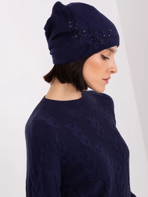Navy blue knitted beanie with appliqué