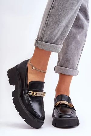 Classic moccasins on a massive black catch me platform!