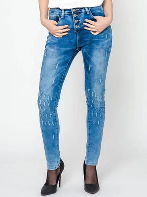 Jeans decorated with abrasions with blue button fastening