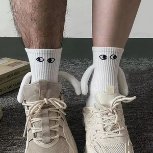 Fashion Funny Creative Magnetic Attraction Hands Black White Cartoon Eyes Couples Socks 2 Pair Club Celebrity Couple Socks Ins