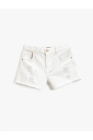 Koton Denim shorts with pockets, frayed details, cotton tassels around the edges, and an adjustable elasticated waist.