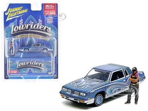 1984 Oldsmobile Cutlass Lowrider Blue Metallic with Graphics and Blue Interior and Diecast Figure Limited Edition to 3600 pieces Worldwide 1/64 Dieca