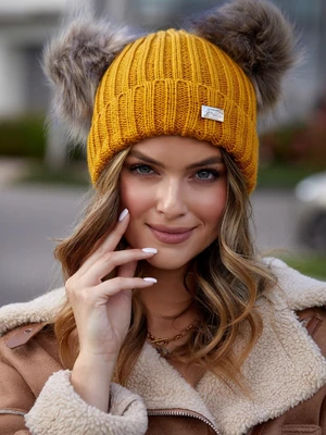Mustard cap with pompom for the winter