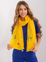 Yellow long women's scarf with appliqués