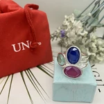 The 2022 new UNO DE 50 fashion silver plated triple blue and red green sapphire ring is a niche jewelry gift