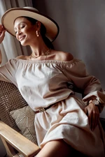 Oversized trapezoidal dress with puffed bottom part of beige color