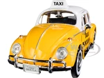 1966 Volkswagen Beetle "Taxi" Yellow with White Top 1/24 Diecast Model Car by Motormax