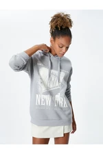 Koton Hooded Sweatshirt with a slogan printed, comfortable fit with long sleeves. Koton Hooded Sweatshirt with a slogan printed, comfortable fit with long sleeves.