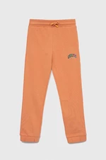 Dětské bavlněné tepláky Guess oranžová barva