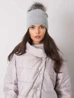 Gray winter cap with pompom