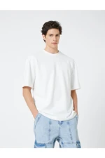 Koton Basic Oversize T-Shirt with a Crew Neck Short Sleeves.