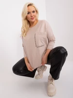 Beige women's plus size blouse with a longer back