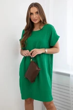 Dress with green pockets