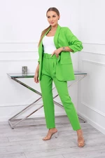 Elegant set of jacket and trousers light green color