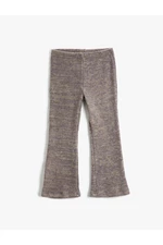 Koton Spanish Leg Trousers have a loose fit, soft texture.