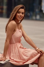 Powder dress with thin shoulder straps and ruffles