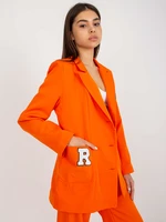 Orange oversize jacket with patches