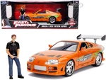 1995 Toyota Supra Orange Metallic with Lights and Brian Figurine "Fast &amp; Furious" Movie 1/18 Diecast Model Car by Jada