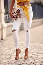 White denim jeans with holes