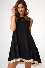 Black dress with frill and guipure