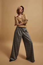 Wide legged plaid trousers