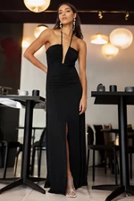 Čierne šaty s otvoreným pásom/korčuľové pletené dlhé večerné šaty od značky Trendyol