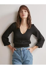Jimmy Key Women's Black V-Neck Button Detailed Blouse with Elastic Waist And Sleeves.