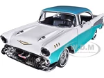 1957 Chevrolet Bel Air Lowrider Turquoise Metallic and White "Get Low" Series 1/24 Diecast Model Car by Motormax