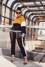 Women's sports set with mustard hood
