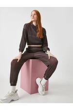 Koton Pocket Jogger Pants with Elastic Waist and Pockets.