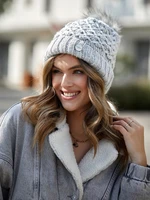 Warm winter beanie with pompom, light gray