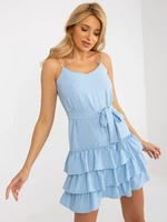 Light blue minidress with ruffles and tie