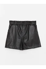 LC Waikiki Girl's Leather-Look Shorts with Elastic Waist.