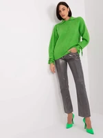 Light green turtleneck with ties on the sleeves