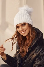 Warm cap with beads and a white pompom
