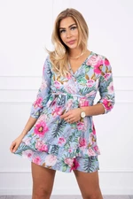 Floral dress with a tie at the waist of cyan color
