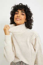 Béžový pletený sveter s rolákom a skráteným strihom od značky Trendyol